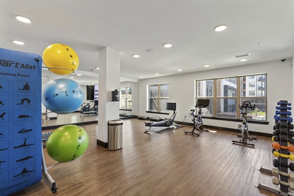 Yoga and spin studio with modern equipment at The Jameson at the Bluffs Apartments