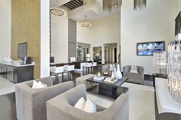 Clubhouse at Circuit Apartments: Modern community space featuring lounge seating and entertainment areas in luxury Austin apartments