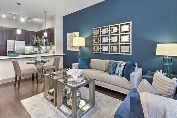 Modern living room with sleek dÃ©cor at Circuit Apartments, enhancing urban luxury apartment living