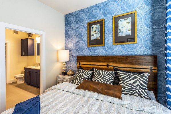 Cozy bedroom with modern decor at Foundry on 19th Apartments