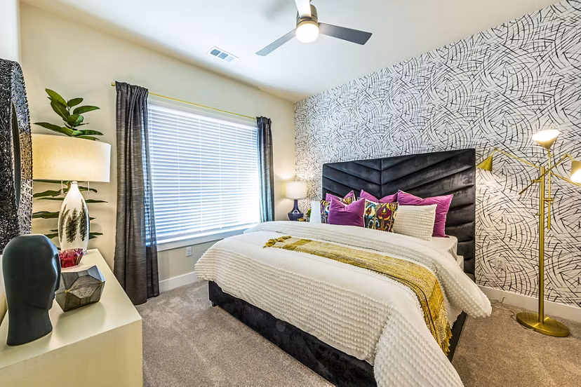 Bedroom featuring modern design and cozy decor at Foundry on 19th Apartments