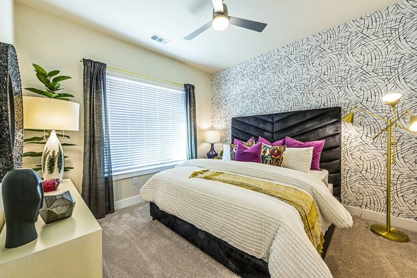 Bedroom featuring modern design and cozy decor at Foundry on 19th Apartments