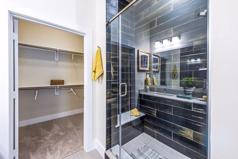 Bathroom featuring modern fixtures and sleek design at Foundry on 19th Apartments