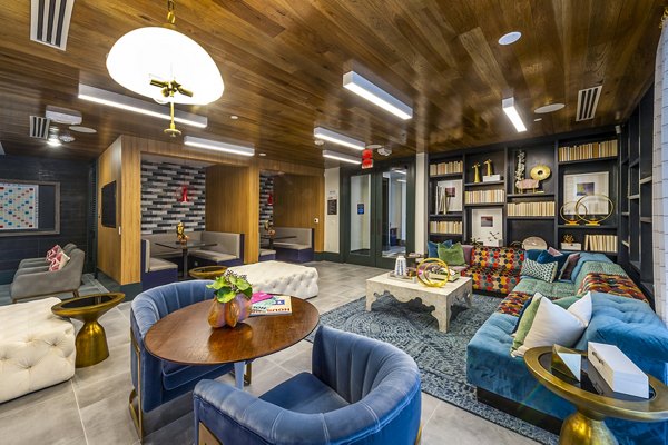 Chic clubhouse with modern lounge seating at Foundry on 19th Apartments, ideal for gatherings and socializing