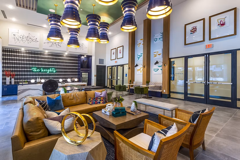 Clubhouse/lobby with stylish seating and modern decor at Foundry on 19th Apartments