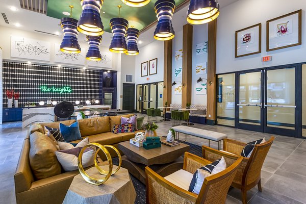 Clubhouse/lobby with stylish seating and modern decor at Foundry on 19th Apartments
