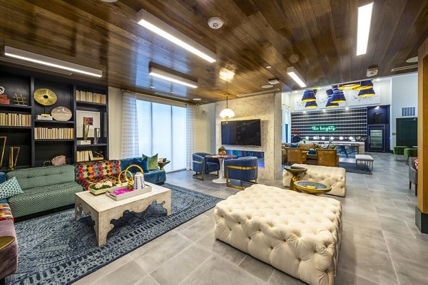 Clubhouse lobby featuring modern decor and seating at Foundry on 19th Apartments