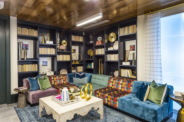 Clubhouse lobby with contemporary design and seating at Foundry on 19th Apartments