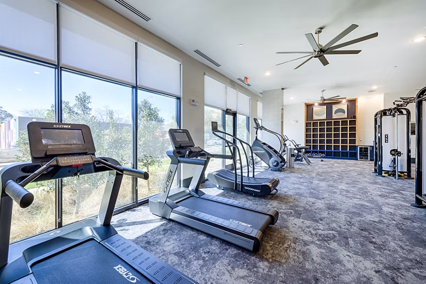 Well-equipped fitness center with modern gym equipment at Foundry on 19th Apartments, ideal for a healthy lifestyle