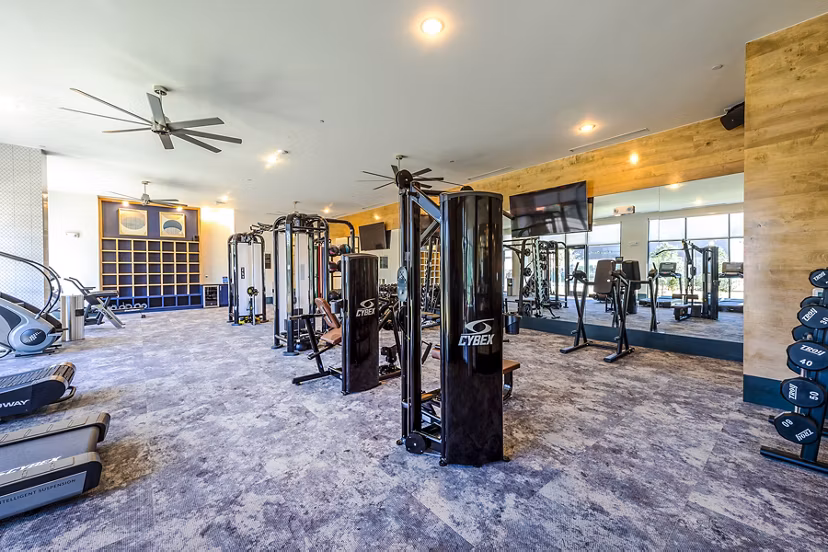Modern fitness center with state-of-the-art equipment at Foundry on 19th Apartments