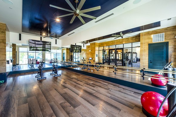 Fitness center with modern equipment at Foundry on 19th Apartments
