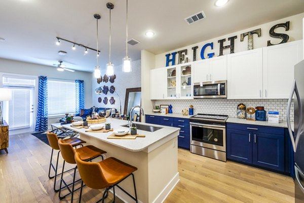 Kitchens with stainless steel appliances at Foundry on 19th Apartments