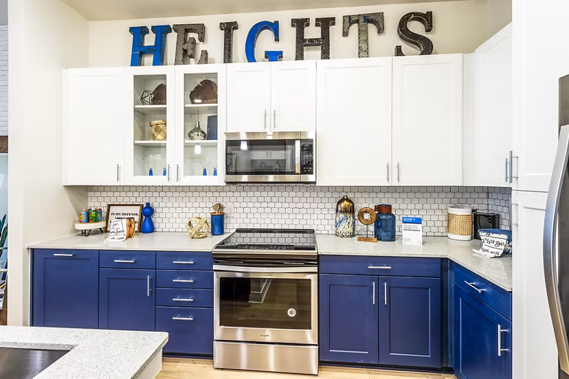 Modern kitchen with stainless steel appliances in Foundry on 19th Apartments