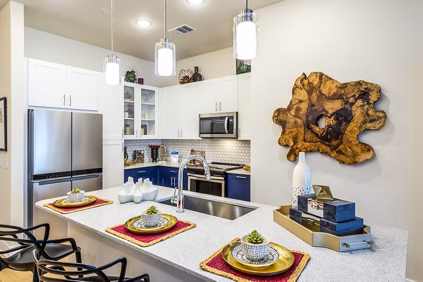 Modern kitchen featuring stainless steel appliances at Foundry on 19th Apartments