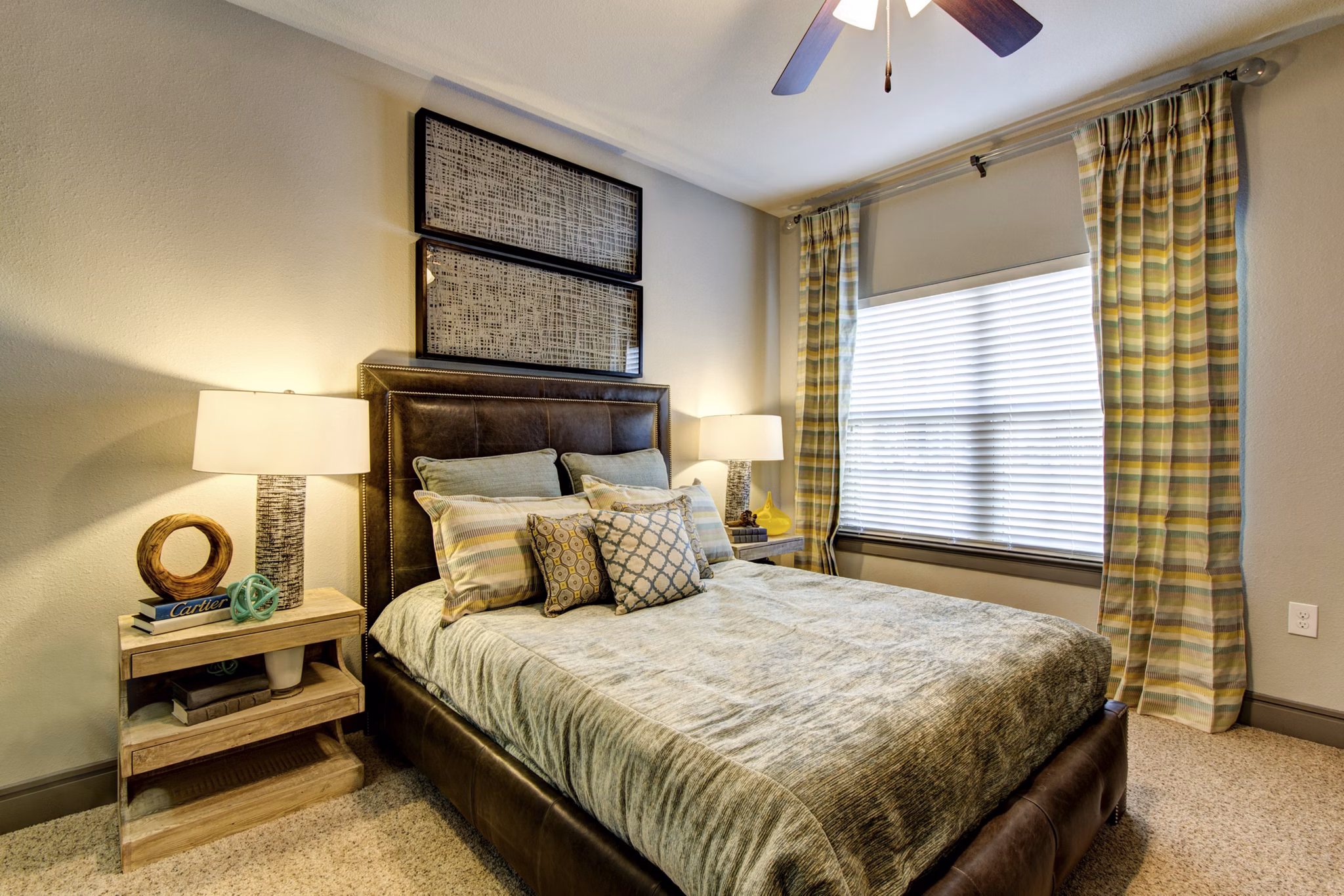 Spacious bedroom featuring modern decor at The Manor at Weston Apartments, a luxury community by Greystar