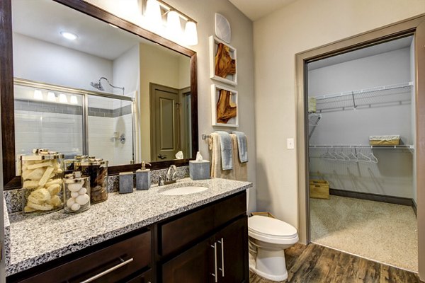 Modern bathroom featuring sleek fixtures at The Manor at Weston Apartments