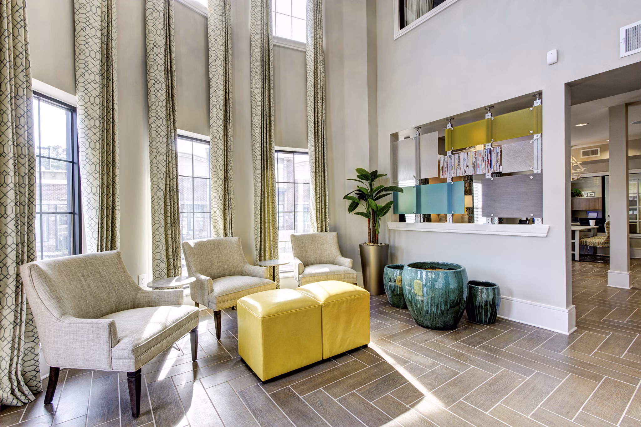 Luxurious clubhouse with modern furnishings at The Manor at Weston Apartments, perfect for social gatherings and relaxing moments