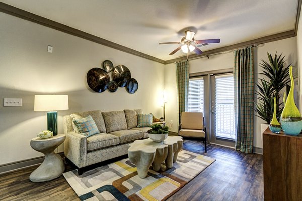 Spacious living room with contemporary design in The Manor at Weston Apartments