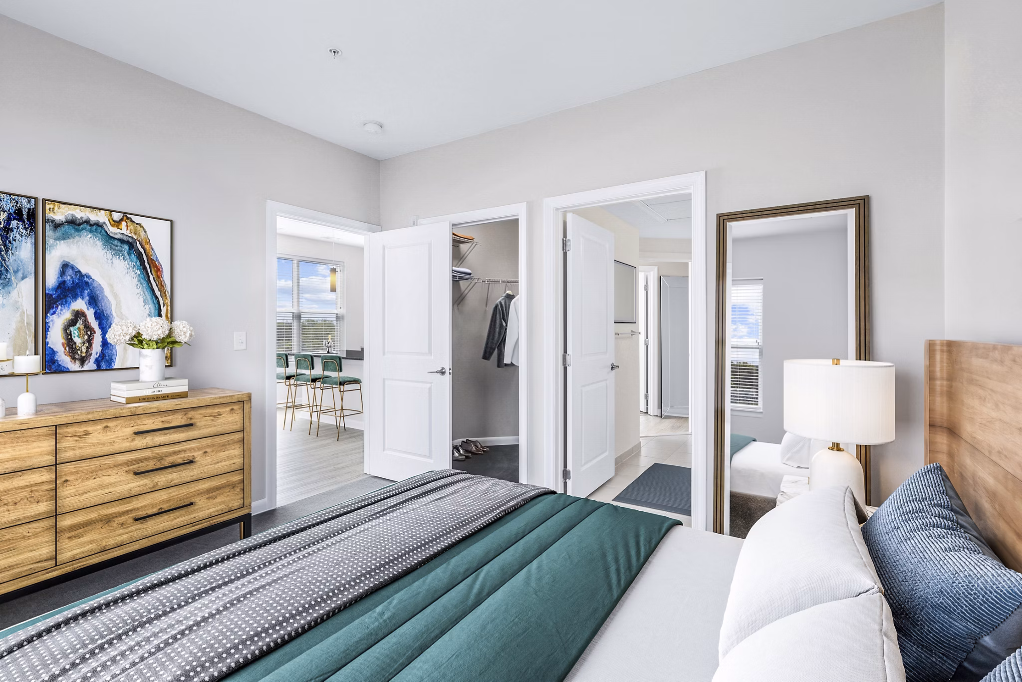 Cozy bedroom with modern decor at Pike3400 Apartments
