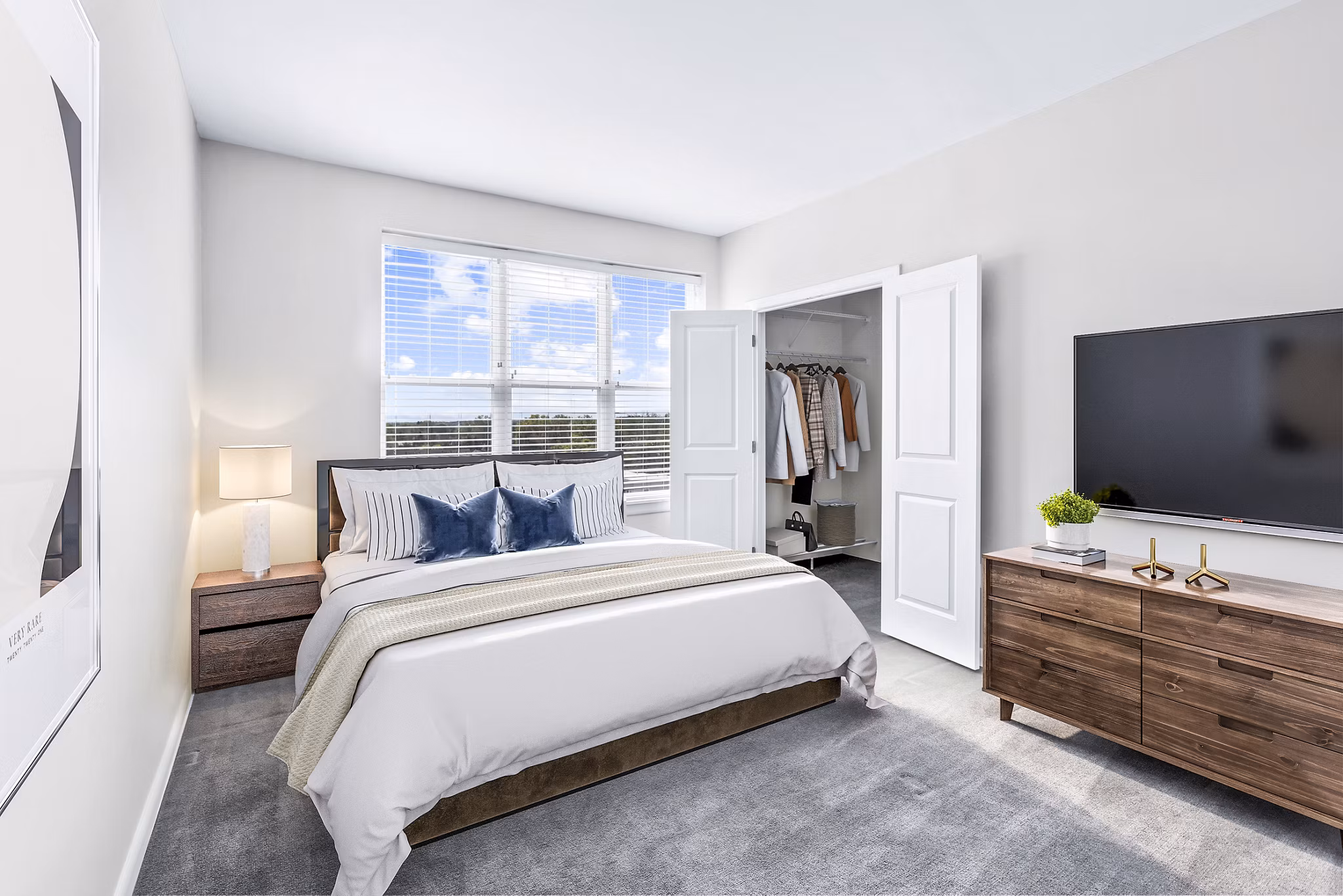 Bedroom featuring modern decor and plush bedding at Pike3400 Apartments in downtown Baltimore