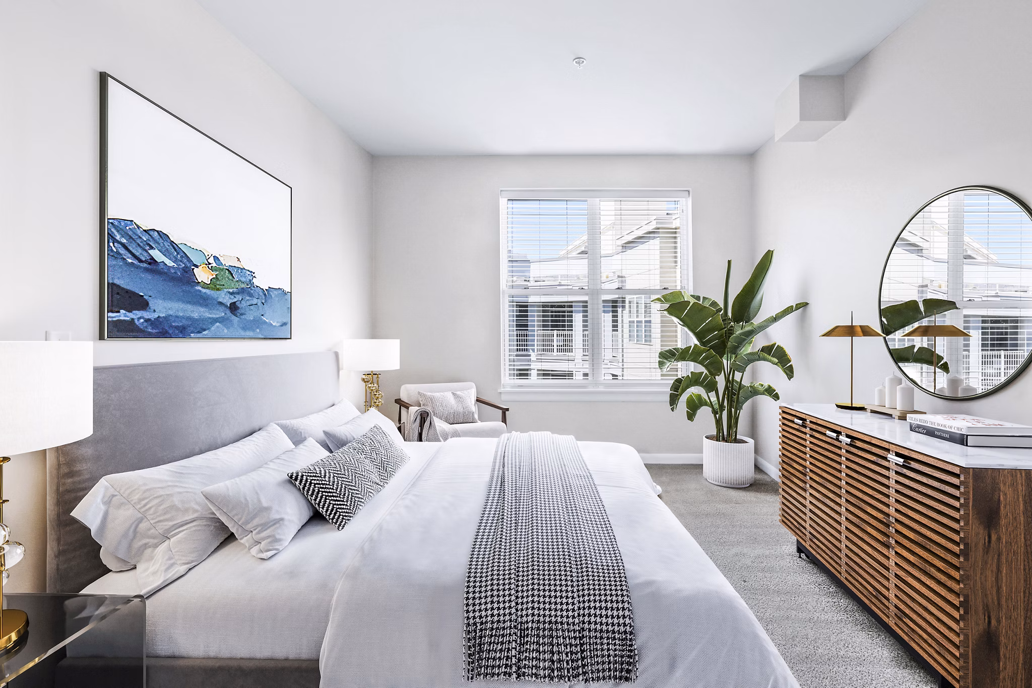 Cozy bedroom with modern furnishings at Pike3400 Apartments