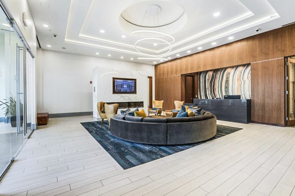 Modern clubhouse lobby featuring elegant furnishings at Pike3400 Apartments