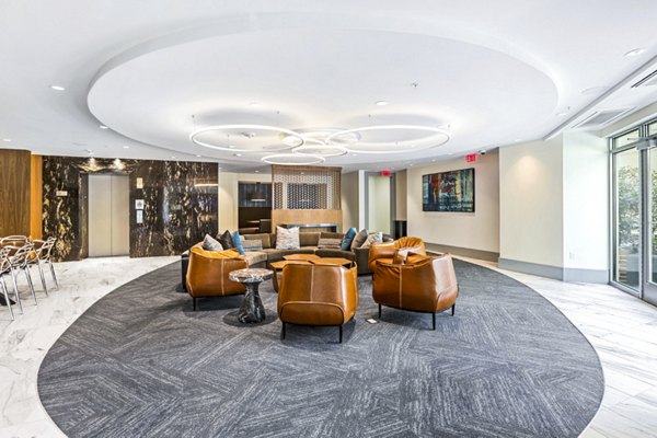 Clubhouse lobby featuring modern design elements at Pike3400 Apartments