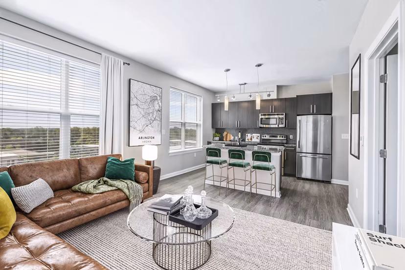 Spacious living room with modern decor at Pike3400 Apartments