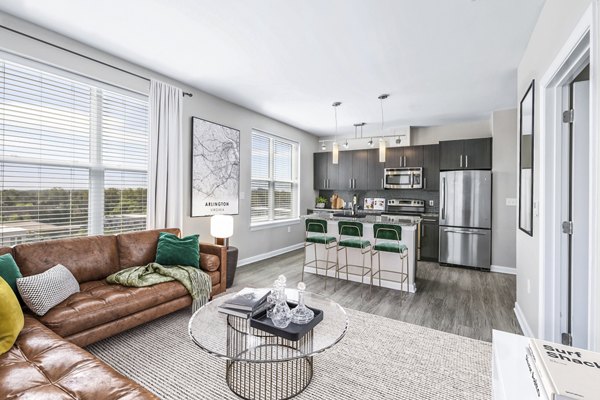 Spacious living room with modern decor at Pike3400 Apartments