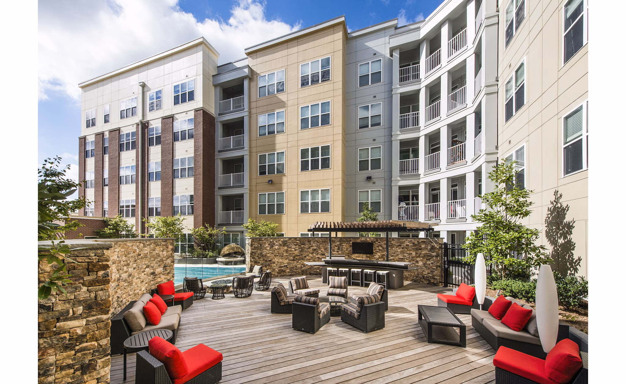Outdoor BBQ area with modern grills at Pike3400 Apartments, ideal for entertaining and social gatherings