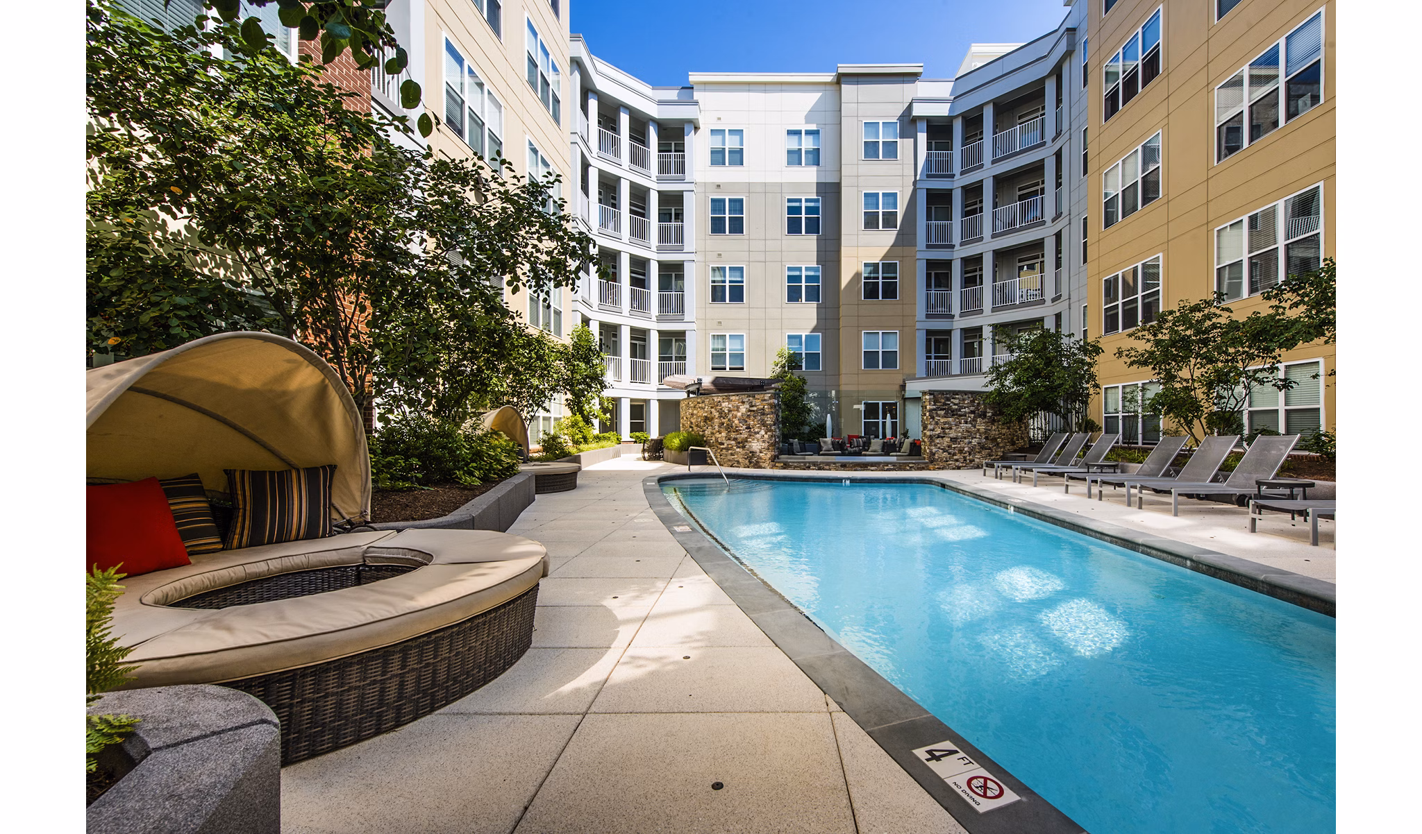 Luxurious rooftop pool overlooking the city at Pike3400 Apartments