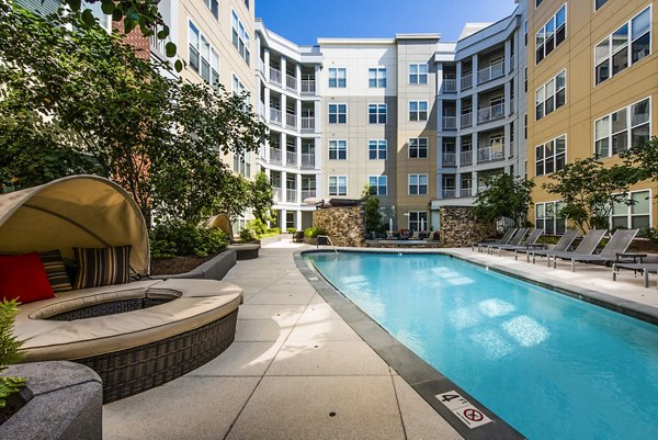 Luxurious rooftop pool overlooking the city at Pike3400 Apartments