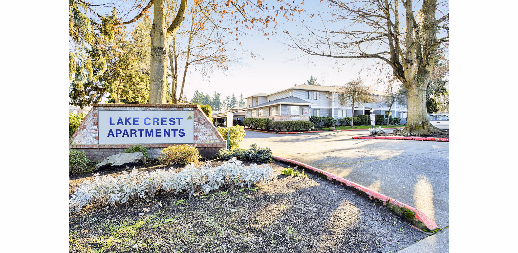 Welcome signage at Lake Crest Apartments: Luxurious living in a serene environment