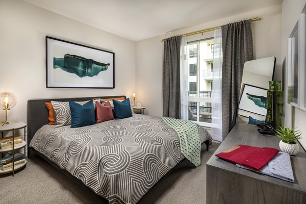 Bedroom showcasing luxurious design and modern furnishings at Cameo Apartments