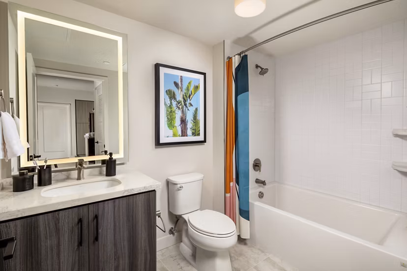 Bathroom with sleek fixtures and minimalist design in Cameo Apartments