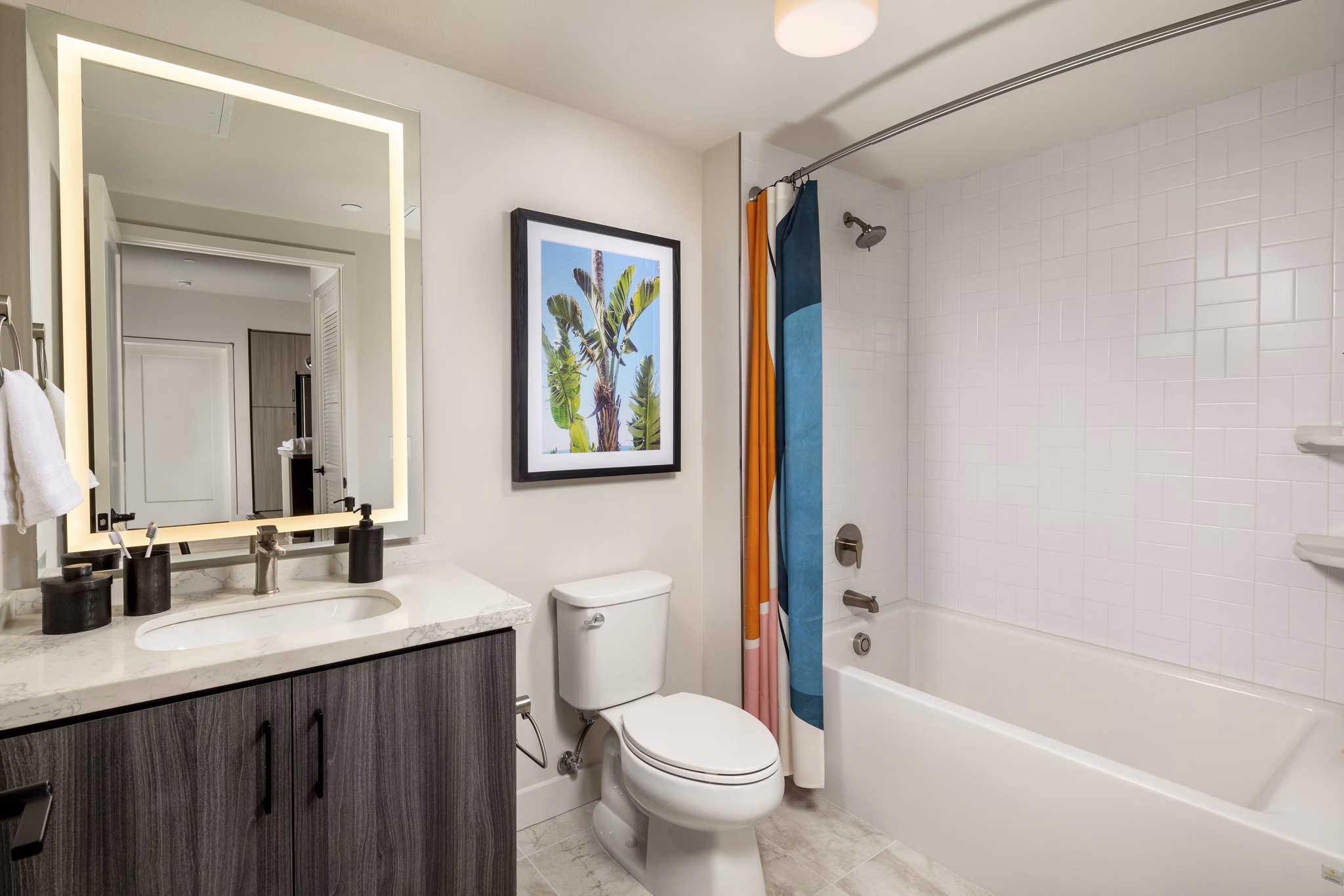 Bathroom with sleek fixtures and minimalist design in Cameo Apartments