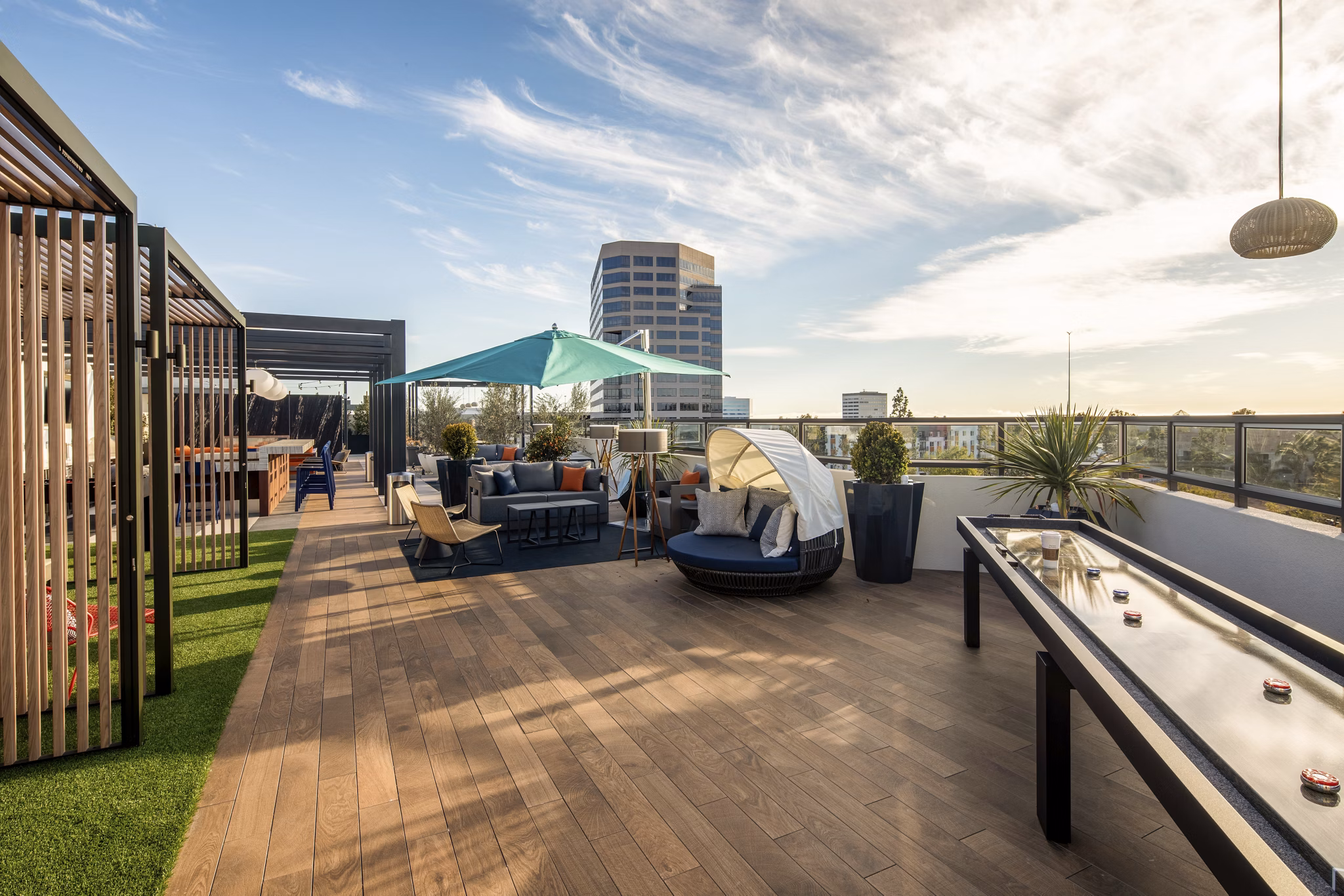Scenic rooftop deck with cozy seating areas at Cameo Apartments