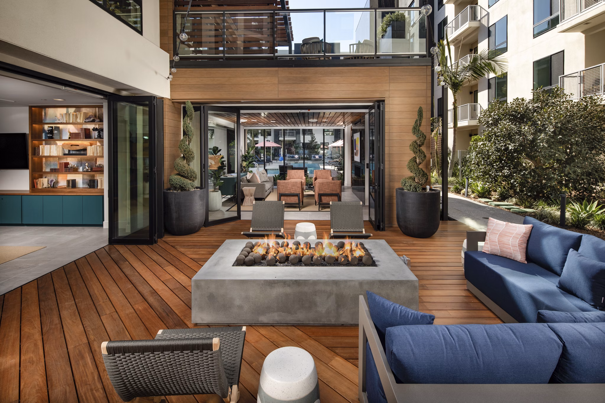 Fire pit lounge area at Cameo Apartments offering cozy outdoor seating for relaxing evenings