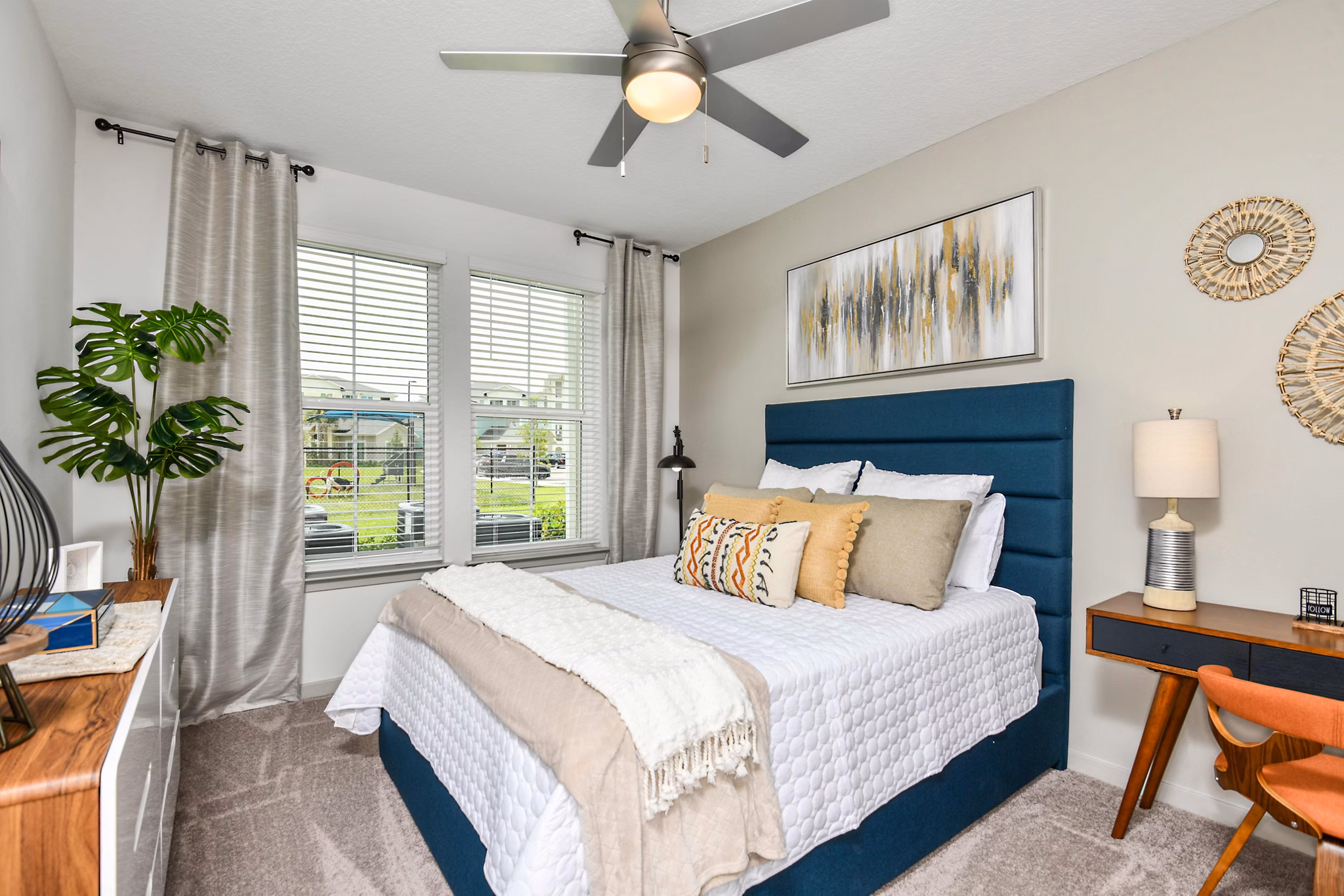 Spacious bedroom with modern furnishings at Isla Apartments, offering luxury living in Greystar's vibrant urban community