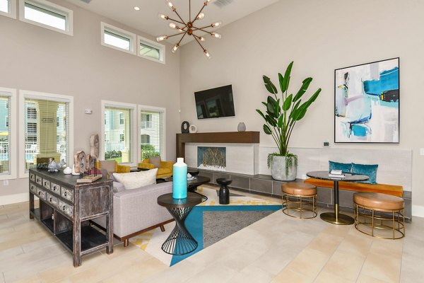 Clubhouse featuring modern design and lounge space at Isla Apartments