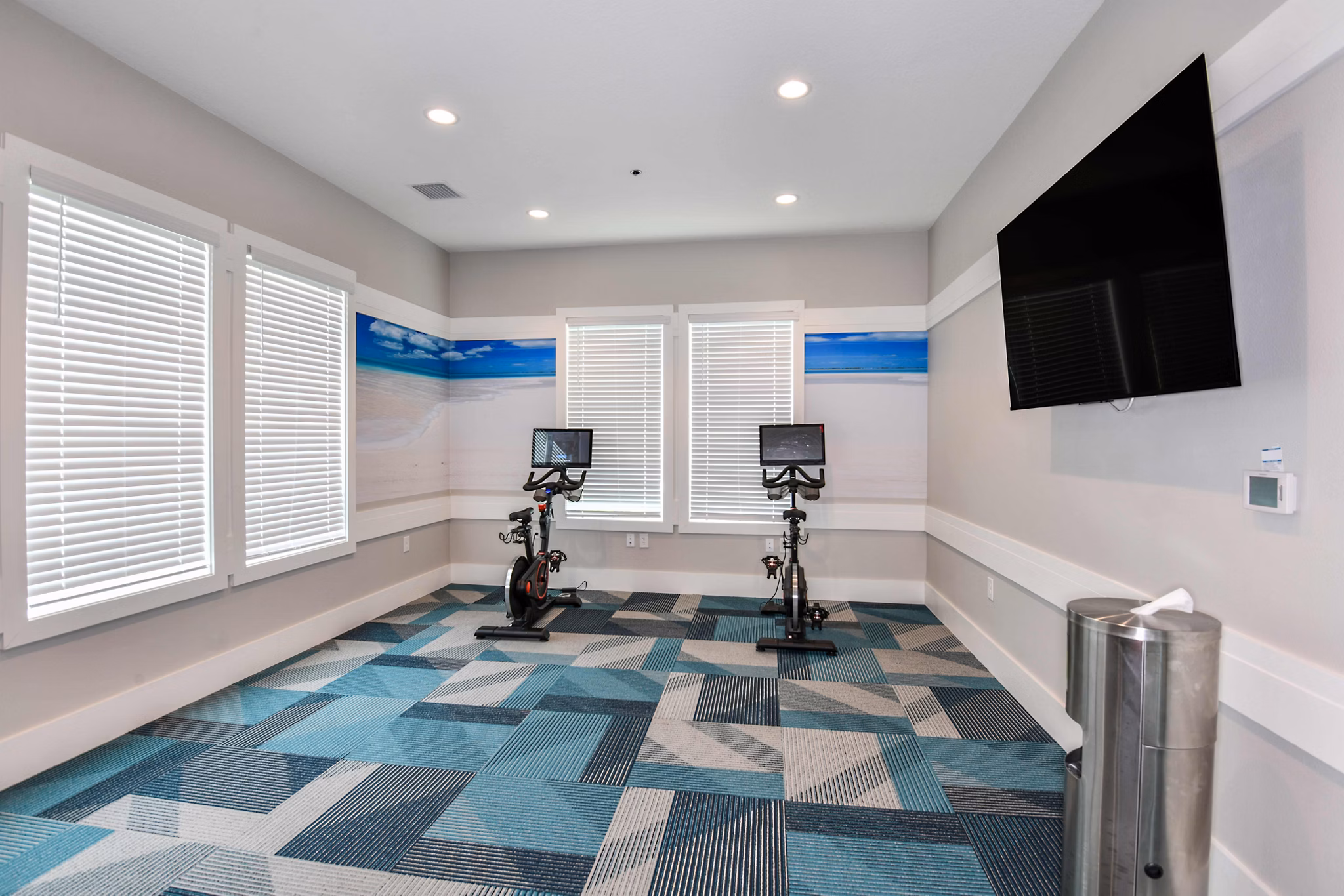 State-of-the-art fitness center at Isla Apartments with modern equipment and ample space for workouts