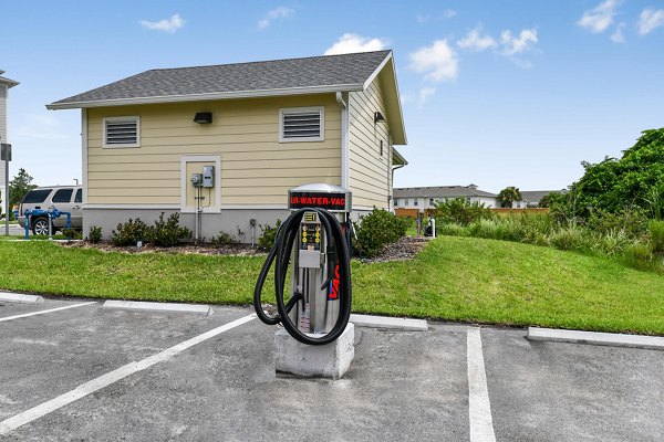 Car care station at Isla Apartments with convenient amenities for residents