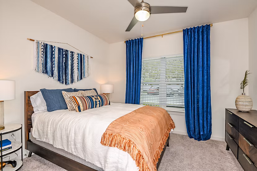 Cozy bedroom with stylish decor at Renaissance Santa Rosa Apartments