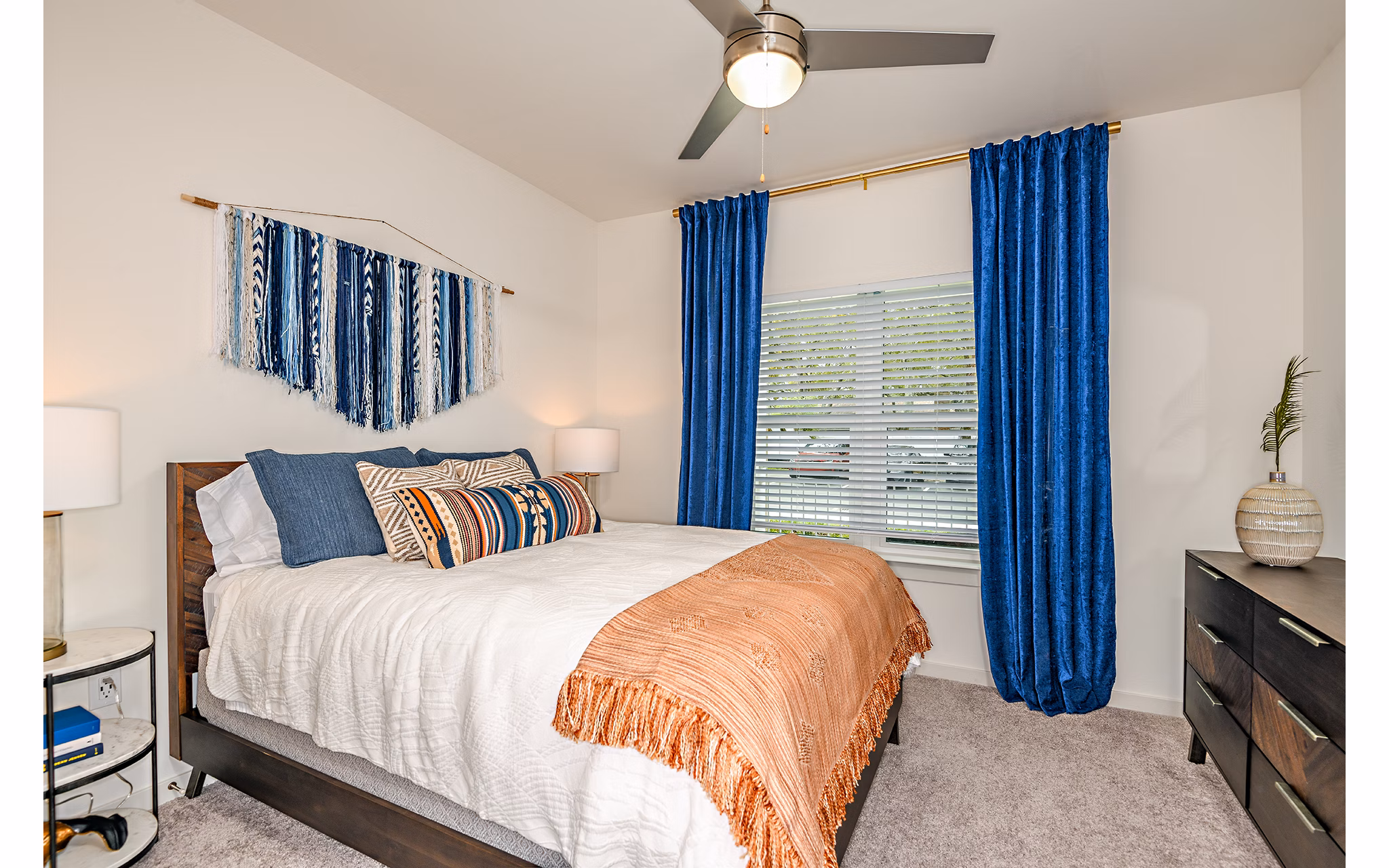 Cozy bedroom with stylish decor at Renaissance Santa Rosa Apartments