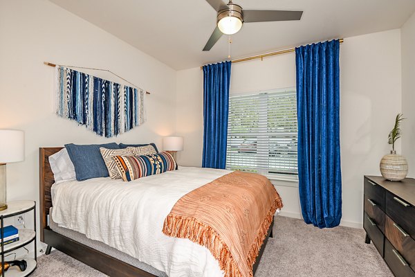 Cozy bedroom with stylish decor at Renaissance Santa Rosa Apartments