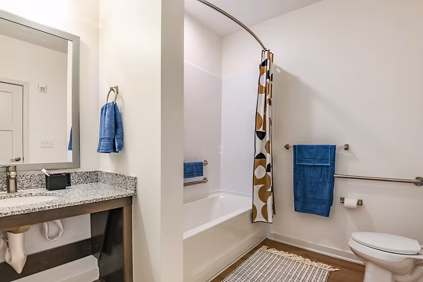 Bathroom featuring sleek fixtures and modern design at Renaissance Santa Rosa Apartments