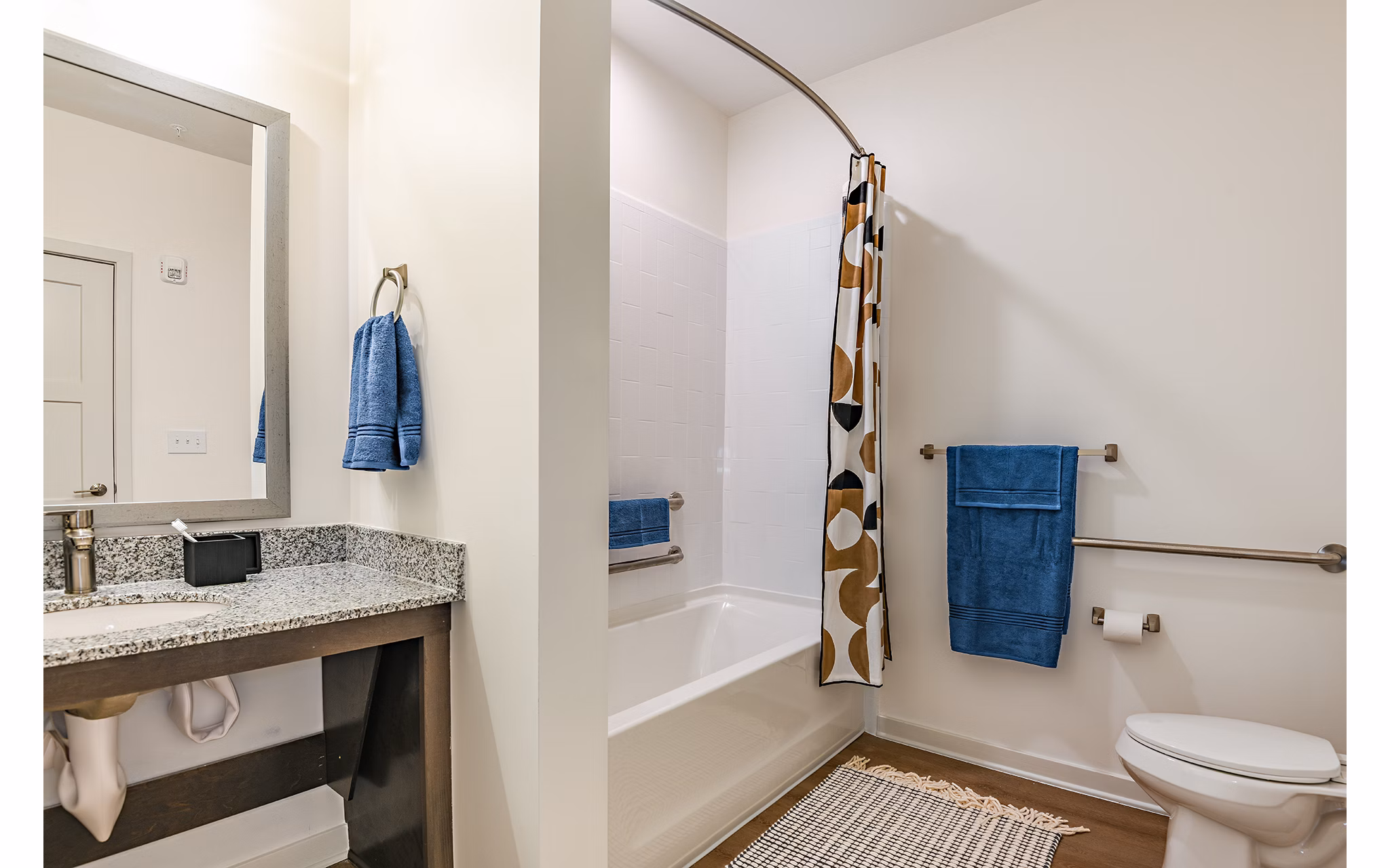 Bathroom featuring sleek fixtures and modern design at Renaissance Santa Rosa Apartments