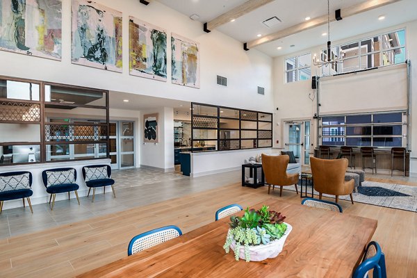 Elegant clubhouse at Renaissance Santa Rosa Apartments with modern seating and decor