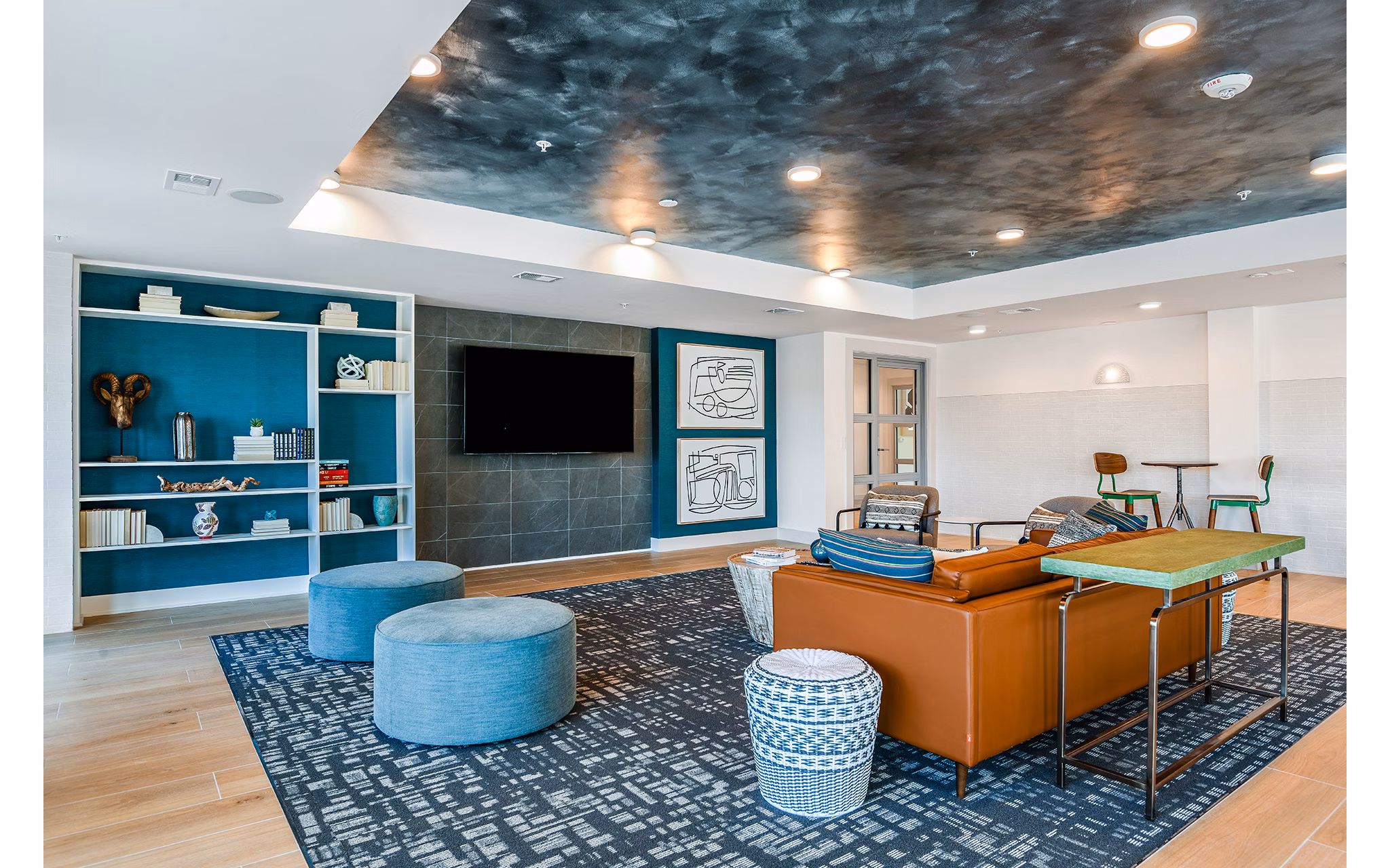 Clubhouse with modern design and ample seating at Renaissance Santa Rosa Apartments, a luxury community in Santa Rosa