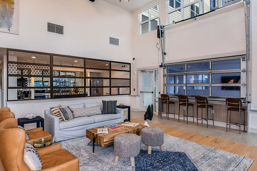 Modern clubhouse with sleek interiors at Renaissance Santa Rosa Apartments, offering luxury amenities for residents